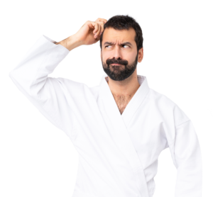 Judoka ceinture blanche débutant qui se pose des questions