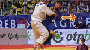 Ashi guruma sur un adversaire qui avance en combat de judo